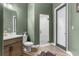 Bathroom with a glass-enclosed shower and modern vanity at 7376 Fall St, Brooksville, FL 34613