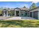 Charming single-story home with a well-manicured lawn and a double garage at 7376 Fall St, Brooksville, FL 34613
