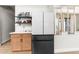 Modern kitchen featuring stainless steel appliances, custom cabinetry, and unique mirror decor at 7376 Fall St, Brooksville, FL 34613