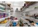 Well-organized walk-in pantry with ample shelving for storage and easy accessibility to goods at 7376 Fall St, Brooksville, FL 34613