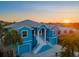 Luxury waterfront home with a two-car garage, stunning sunset views, and a spacious driveway at 7516 Gulf Way, Hudson, FL 34667