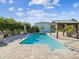 Inviting rectangular pool with a pergola and spacious patio at 7516 Gulf Way, Hudson, FL 34667