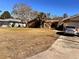 Single-story house with a large yard and driveway, offering ample outdoor space at 140 Callaway Ave, Spring Hill, FL 34606