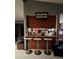 Kitchen with breakfast bar and three barstools at 140 Callaway Ave, Spring Hill, FL 34606