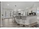 Modern kitchen with stainless steel appliances and an island at 591 Waterford W Cir, Tarpon Springs, FL 34688