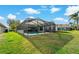 Screened pool and patio area at 591 Waterford W Cir, Tarpon Springs, FL 34688