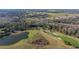 Aerial view of golf course with lake at 13235 Legends Trl, Dade City, FL 33525