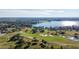 Expansive view of golf course and lakefront property at 13235 Legends Trl, Dade City, FL 33525