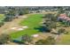 Golf course hole with fairways and sand traps at 13235 Legends Trl, Dade City, FL 33525