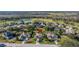 Aerial view of house and surrounding neighborhood at 13235 Legends Trl, Dade City, FL 33525