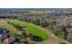 Golf course hole with lush green fairways and sand traps at 13235 Legends Trl, Dade City, FL 33525