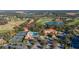 Aerial view of clubhouse, pool, and tennis courts at 13235 Legends Trl, Dade City, FL 33525