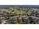 Aerial view of the house and surrounding golf course community at 13235 Legends Trl, Dade City, FL 33525