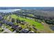 Aerial view of golf course and homes at 13235 Legends Trl, Dade City, FL 33525