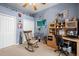 Home office with a desk, chair, and built-in wooden shelving at 13235 Legends Trl, Dade City, FL 33525