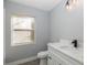 Bathroom with white vanity and modern fixtures at 8835 Thoreau Pl, Hudson, FL 34667