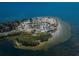 Island with beach, parking, and pavilion; aerial view at 1545 Citrine Trl, Tarpon Springs, FL 34689