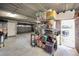 Large garage with shelving and extra storage at 1545 Citrine Trl, Tarpon Springs, FL 34689