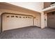 Attached garage with an automatic door opener at 1545 Citrine Trl, Tarpon Springs, FL 34689
