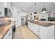 Modern kitchen with stainless steel appliances and wood countertops at 1545 Citrine Trl, Tarpon Springs, FL 34689