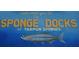 Welcome to Tarpon Springs Sponge Docks sign with a painted fish at 1545 Citrine Trl, Tarpon Springs, FL 34689