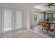 White french doors leading to backyard at 15806 Adobe Dr, Hudson, FL 34667