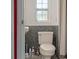 Small bathroom with a toilet, sink, and shower at 15806 Adobe Dr, Hudson, FL 34667
