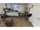 Bedroom with a double bed, nightstand, and TV at 15806 Adobe Dr, Hudson, FL 34667