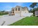 Two-story house with attached garage and driveway at 15806 Adobe Dr, Hudson, FL 34667