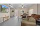 Spacious game room with comfortable seating, a large TV, and plenty of room to entertain at 15806 Adobe Dr, Hudson, FL 34667