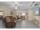 Relaxing game room featuring brown reclining chairs, a pool table, and a large TV at 15806 Adobe Dr, Hudson, FL 34667