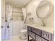 Bathroom with walk-in shower and updated vanity at 2476 Silkwood Ct, Spring Hill, FL 34606