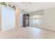 Spacious bedroom with tile floors and ample closet space at 2476 Silkwood Ct, Spring Hill, FL 34606