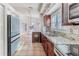 Bright kitchen, featuring stainless steel appliances and ample cabinet space at 2476 Silkwood Ct, Spring Hill, FL 34606