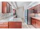Kitchen with granite countertops and stainless steel appliances at 2476 Silkwood Ct, Spring Hill, FL 34606