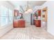 Kitchen with granite countertops and wood cabinets at 2476 Silkwood Ct, Spring Hill, FL 34606
