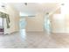 Open living area with tile floors and views to other rooms at 2476 Silkwood Ct, Spring Hill, FL 34606