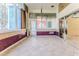 Sunroom featuring tile floors and sliding glass doors at 2476 Silkwood Ct, Spring Hill, FL 34606