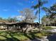 Ranch-style home with a carport and fenced yard at 3234 Ella Ln, New Port Richey, FL 34655