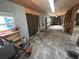 Workshop with concrete floor, shelving, and various tools at 3234 Ella Ln, New Port Richey, FL 34655