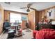 Bright bedroom with double closets and home office setup at 3337 Darlington Rd, Holiday, FL 34691