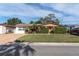 House exterior showcasing a manicured lawn and driveway at 3337 Darlington Rd, Holiday, FL 34691