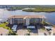 Condo building showcasing waterfront location and parking at 8150 Brent St # 746, Port Richey, FL 34668