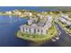 Waterfront condo building, with parking and tennis courts at 8150 Brent St # 746, Port Richey, FL 34668