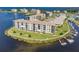 Bird's-eye view of condo complex on a peninsula with water access at 8150 Brent St # 746, Port Richey, FL 34668