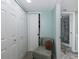 Closet area with seating and access to bathroom at 8150 Brent St # 746, Port Richey, FL 34668