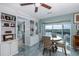 Dining area with water views and built-in shelving at 8150 Brent St # 746, Port Richey, FL 34668