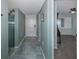Light entryway with patterned floor and view to bedroom at 8150 Brent St # 746, Port Richey, FL 34668