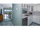 Modern kitchen with stainless steel appliances and white cabinets at 8150 Brent St # 746, Port Richey, FL 34668