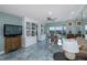 Spacious living room with water views and tiled floors at 8150 Brent St # 746, Port Richey, FL 34668